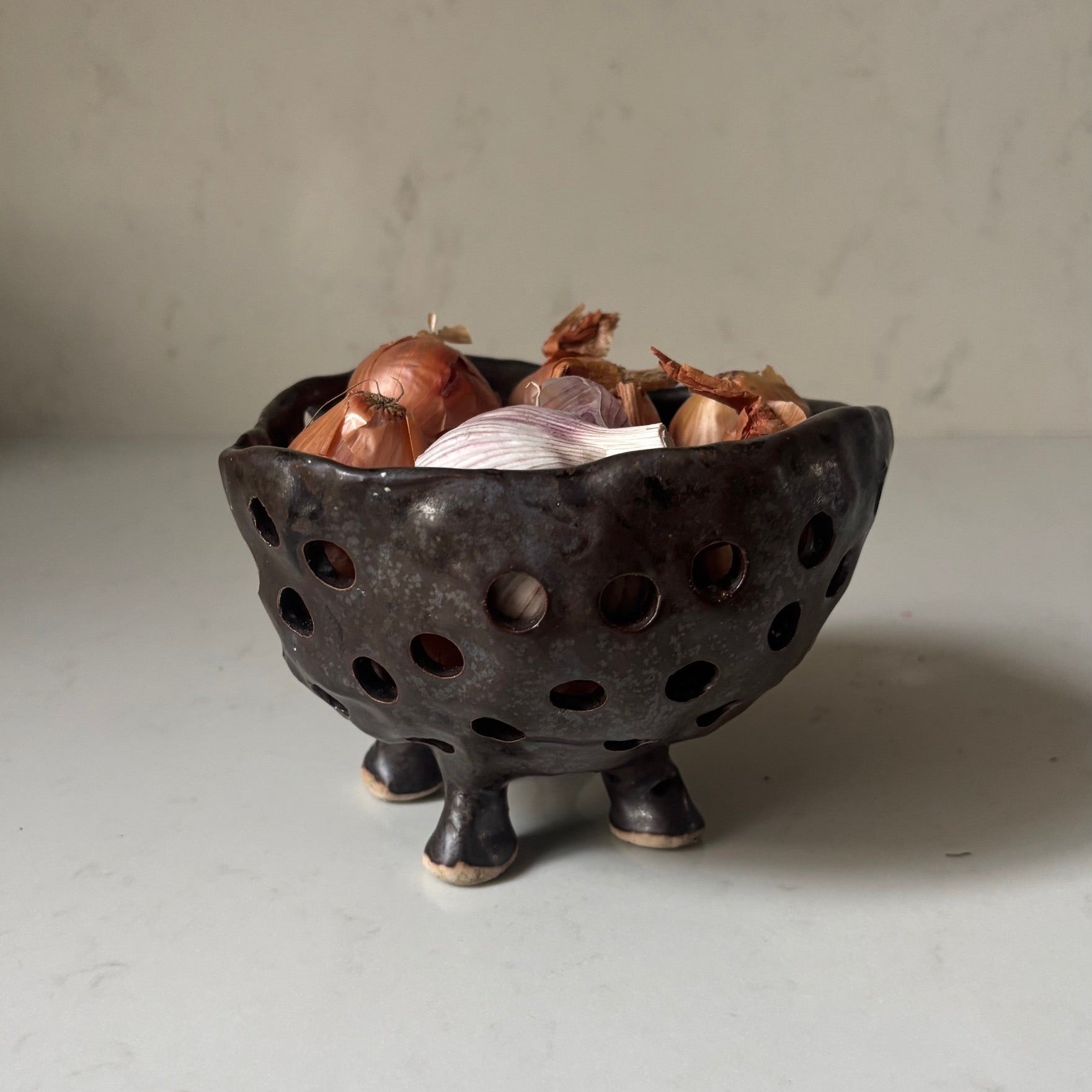 A. Mills Clay Colanders